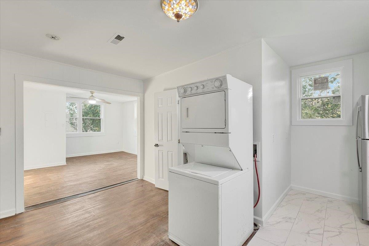 211 North State Street Raleigh, NC 27601 - Photo 46 of 50 a room with a washer and dryer