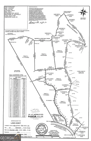 a picture of a room with a white and a bed