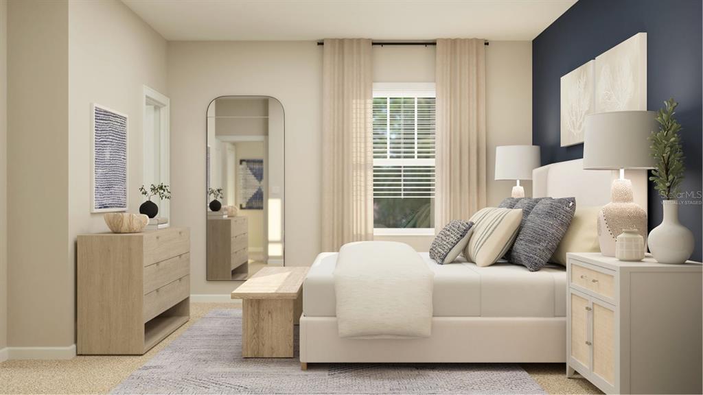 2372 Rider Rain Lane Apopka, FL 32703 - Photo 14 of 23 a bedroom with a bed and a couch