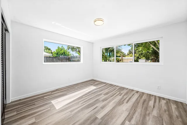 an empty room with windows