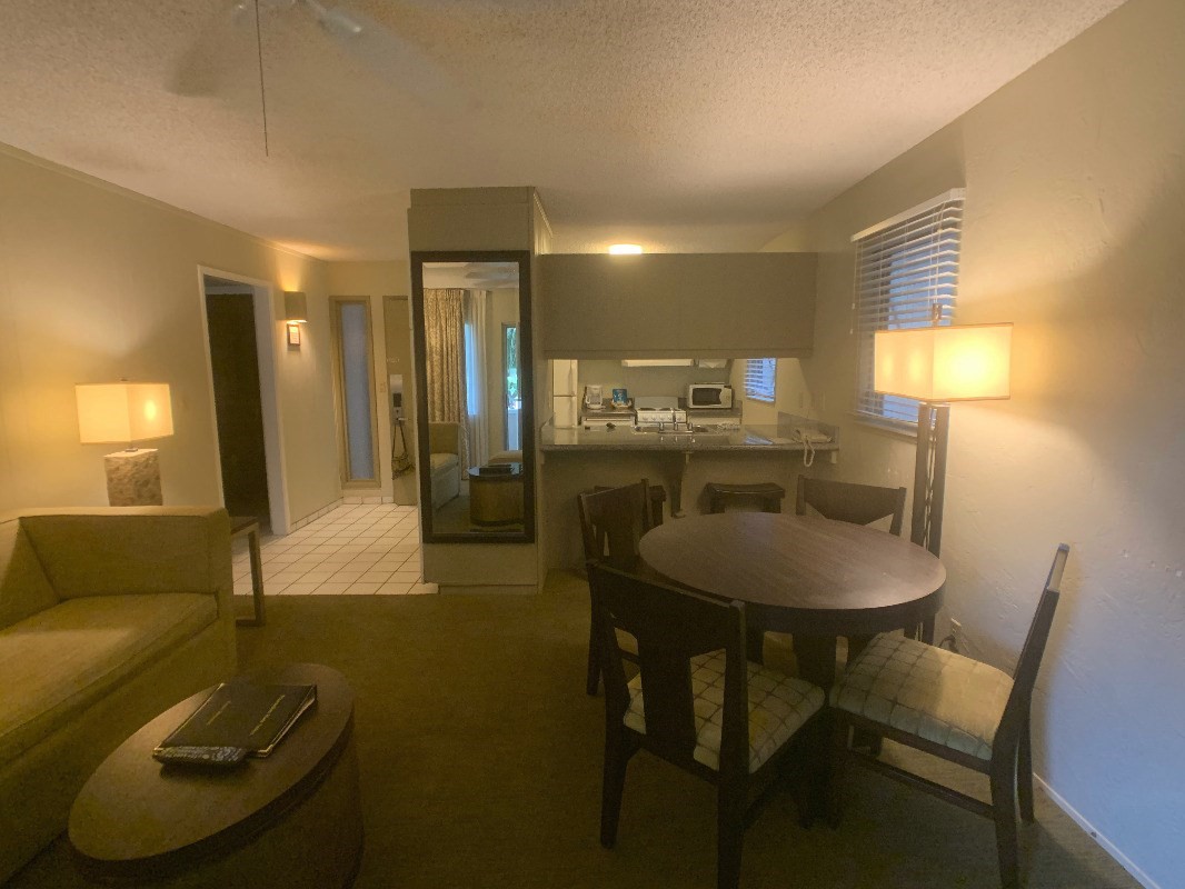 525 Aleka Loop, Unit D5 Kapaa, HI 96746 - Photo 2 of 11 a kitchen with kitchen island a dining table chairs cabinets and stainless steel appliances