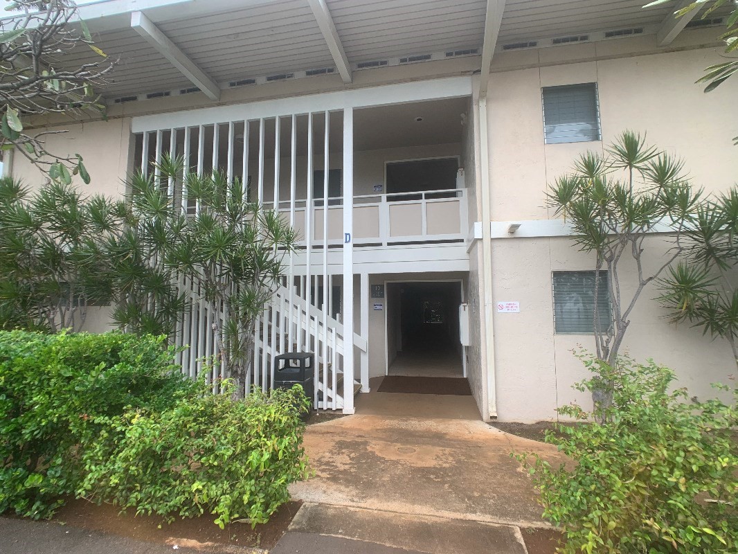 525 Aleka Loop, Unit D5 Kapaa, HI 96746 - Photo 3 of 11 a front view of a house with a porch