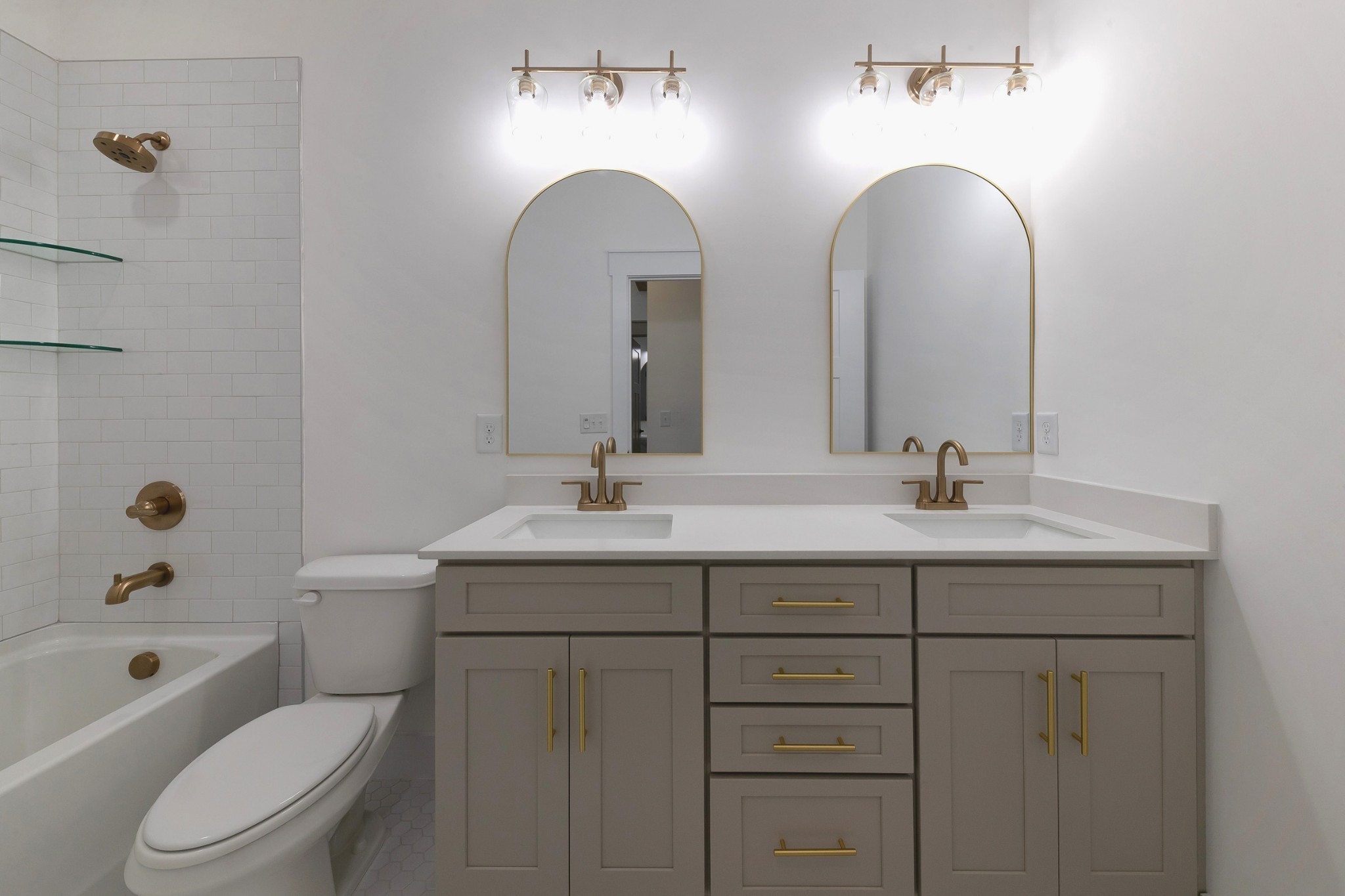 6616 Old Zion Road Columbia, TN 38401 - Photo 12 of 52 a bathroom with 2 sink a toilet and a mirror