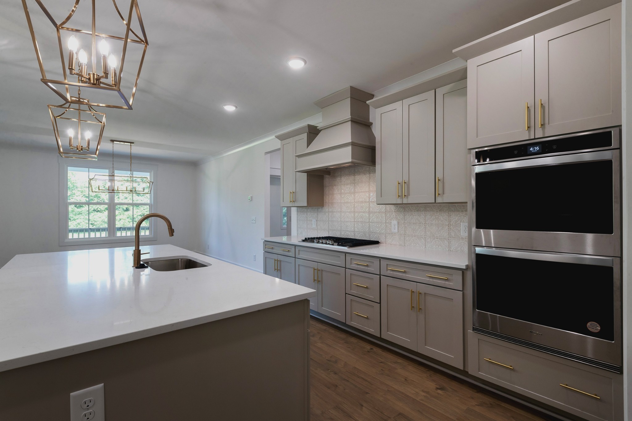 6616 Old Zion Road Columbia, TN 38401 - Photo 15 of 52 a kitchen with kitchen island granite countertop a sink stainless steel appliances and cabinets