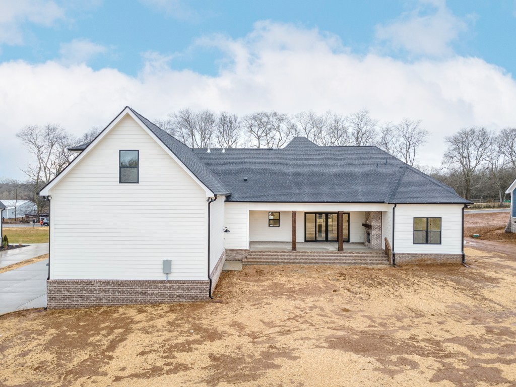 6616 Old Zion Road Columbia, TN 38401 - Photo 15 of 29 a front view of a house with a yard