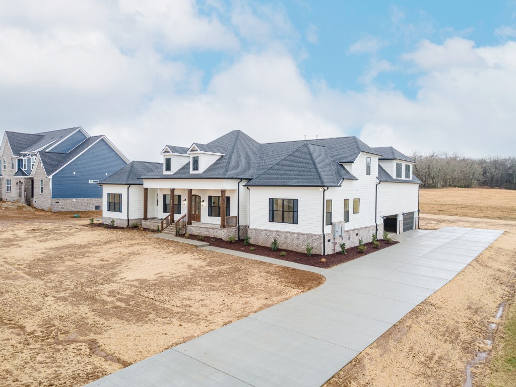 6616 Old Zion Road Columbia, TN 38401 - Photo 2 of 29 a front view of a house with a yard