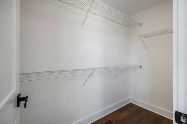 a view of a room with racks on the wall