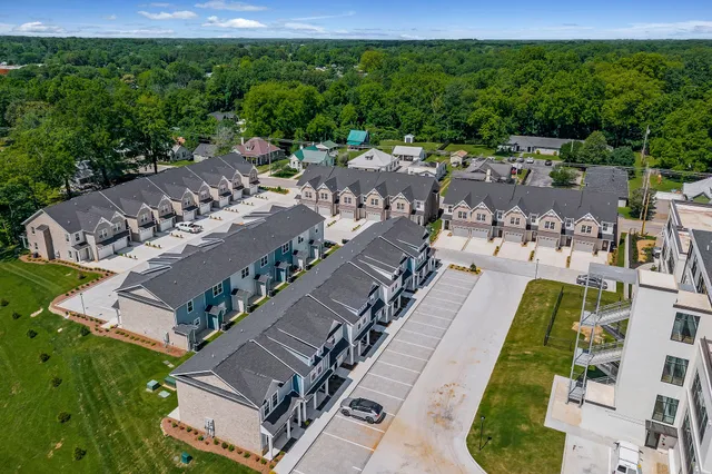 a aerial view of a house with a big yard