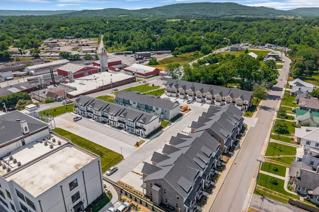 an aerial view of a house with a garden