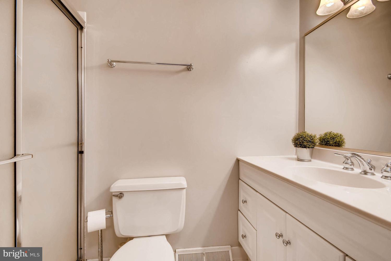 10510 Longbranch Road Cockeysville, MD 21030 - Photo 15 of 28 a bathroom with a toilet sink and shower