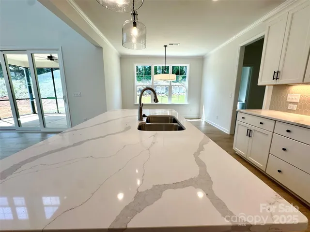 a bedroom with a bed and a cabinets