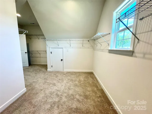 an empty room with a natural light