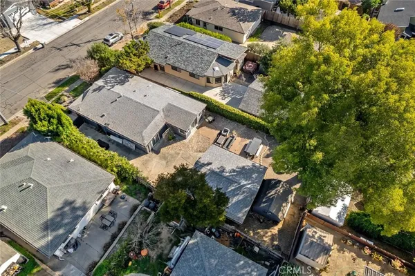 an aerial view of a house with a garden