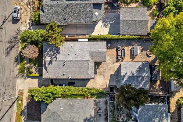 an aerial view of a house with a garden
