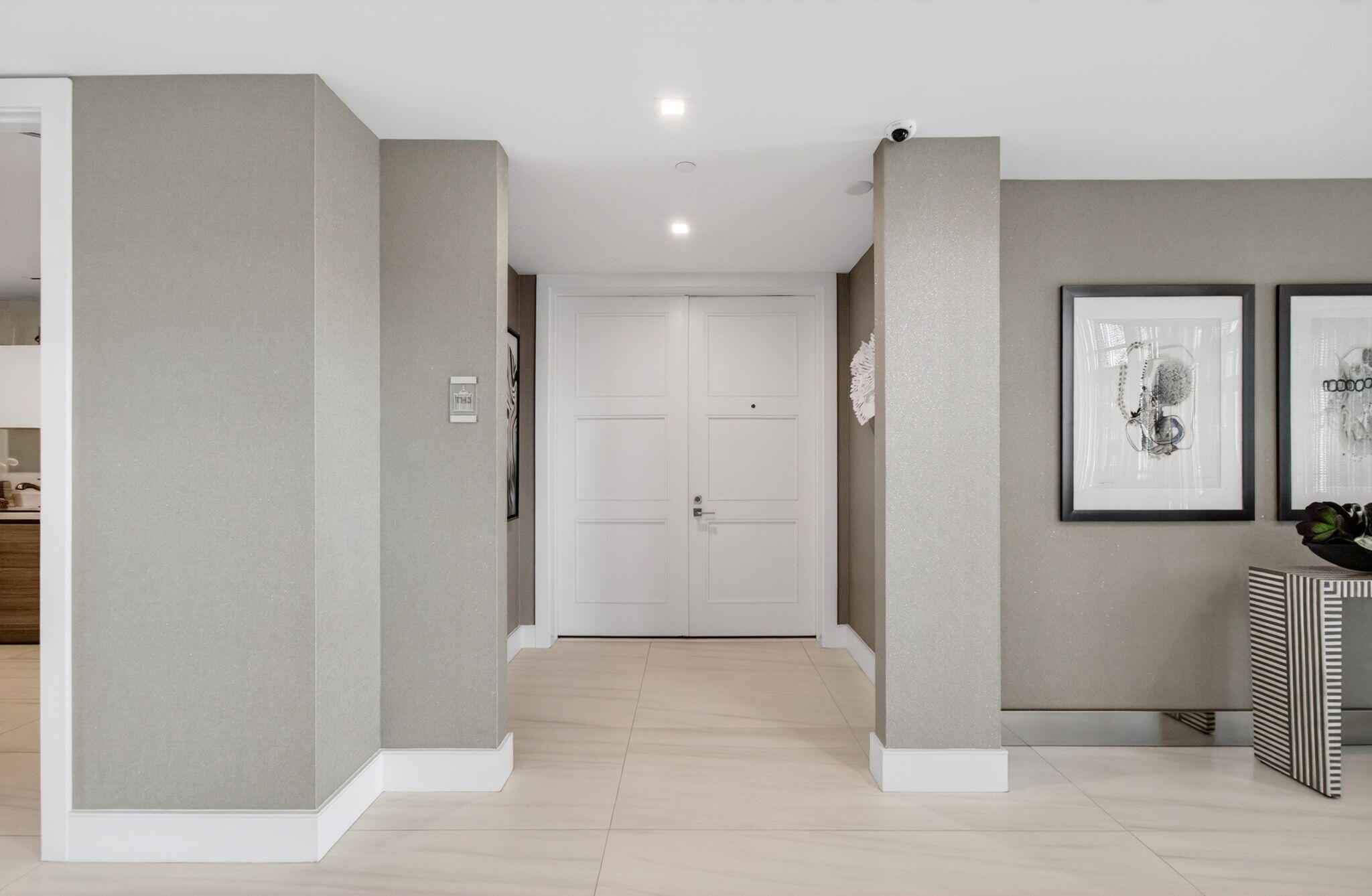 155 East Boca Raton Road, Unit TH3 Boca Raton, FL 33432 - Photo 16 of 139 a view of a hallway with paintings on the wall