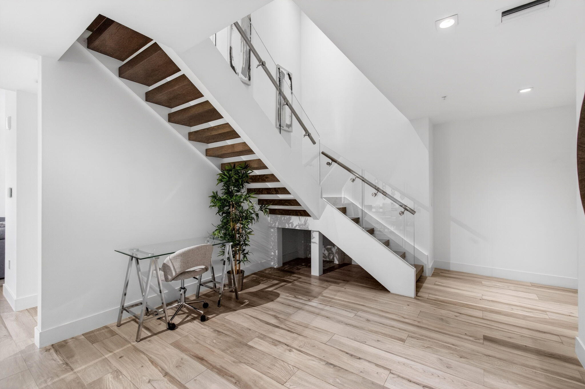 155 East Boca Raton Road, Unit TH3 Boca Raton, FL 33432 - Photo 45 of 139 a view of entryway and hall with wooden floor