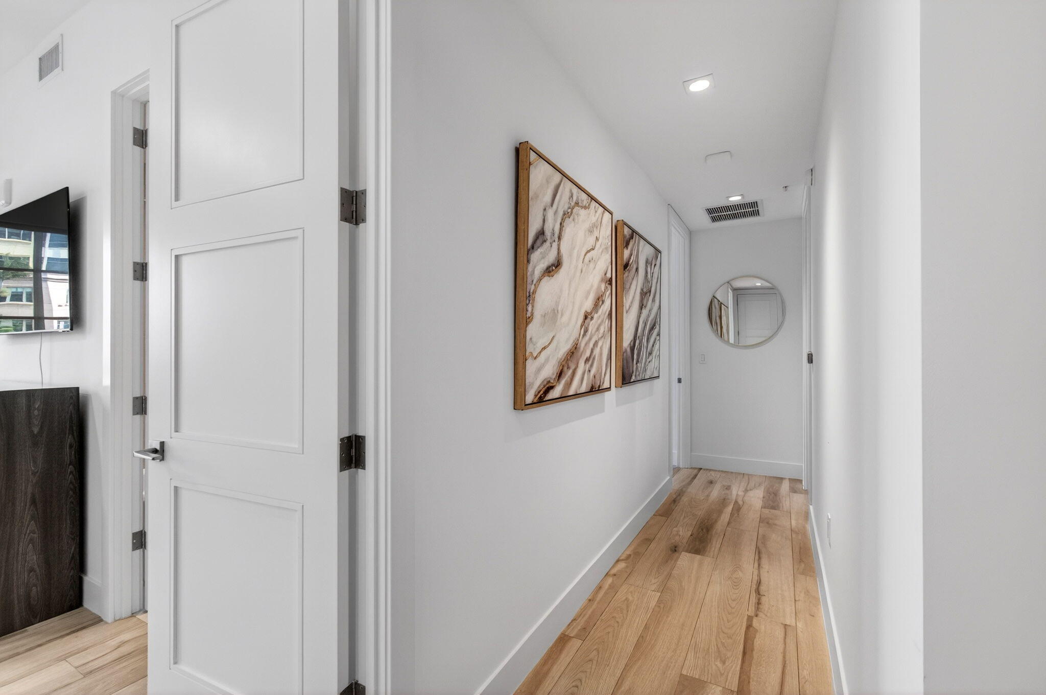 155 East Boca Raton Road, Unit TH3 Boca Raton, FL 33432 - Photo 47 of 139 a view of a hallway with wooden floor and closet