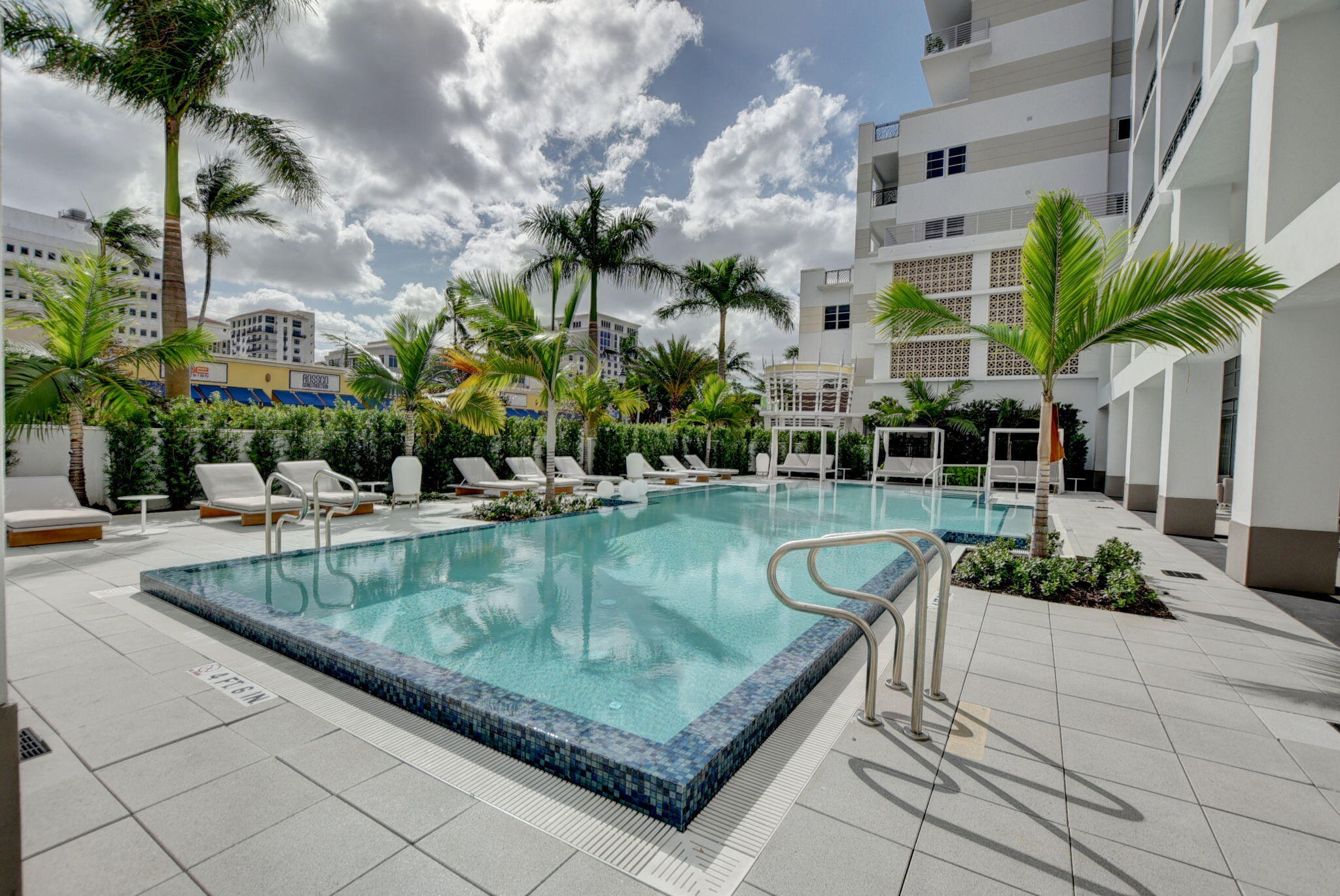 155 East Boca Raton Road, Unit TH3 Boca Raton, FL 33432 - Photo 90 of 139 a view of swimming pool with outdoor seating and plants