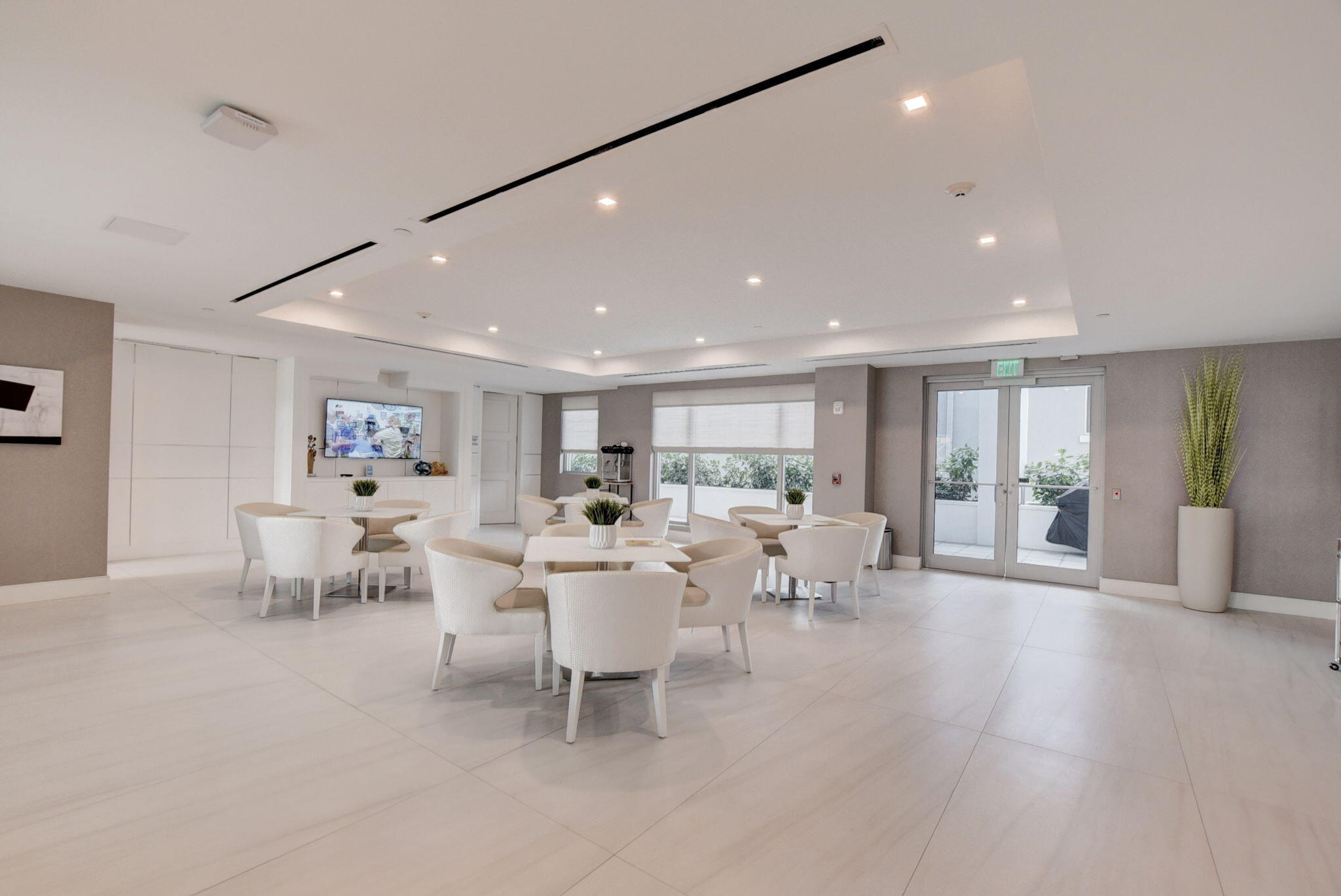 155 East Boca Raton Road, Unit TH3 Boca Raton, FL 33432 - Photo 10 of 139 a view of a dining room with furniture window and wooden floor