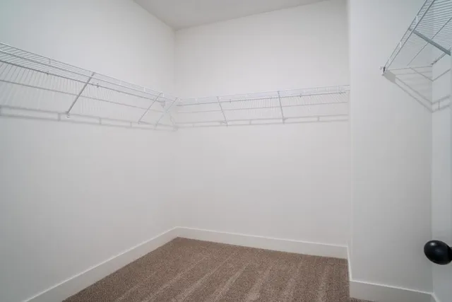 a view of a room with racks on the wall