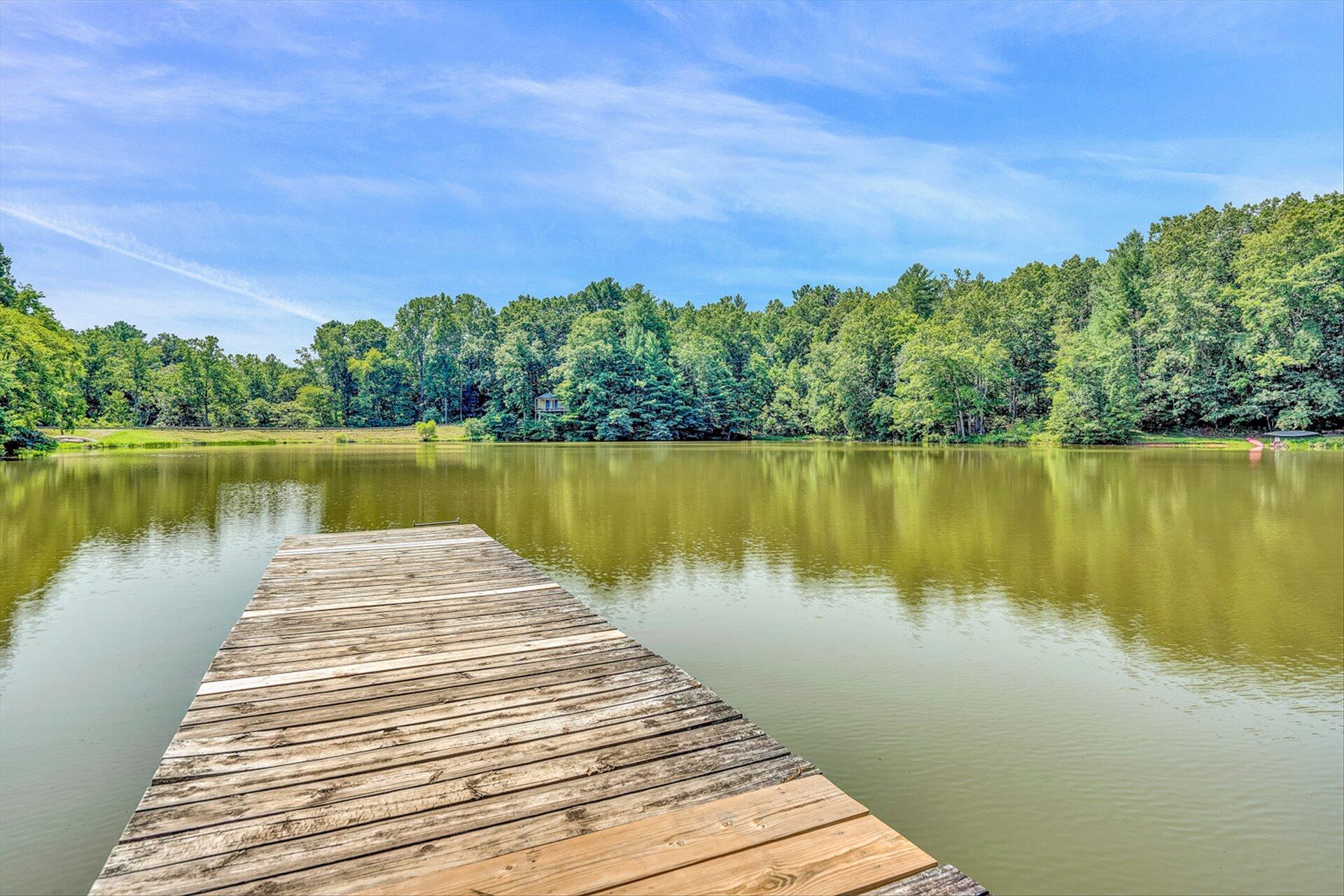 854 Harmony Road Boones Mill, VA 24065 - Photo 15 of 16 a view of a lake with houses