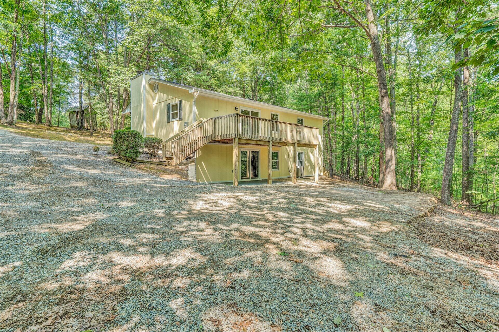 854 Harmony Road Boones Mill, VA 24065 - Photo 9 of 16 a front view of a house with a yard