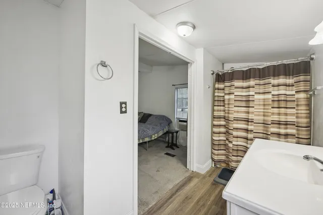 a bathroom with a sink and a shower