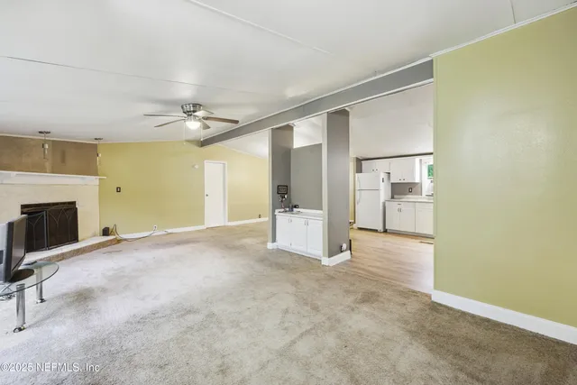 a view of a livingroom with a fireplace