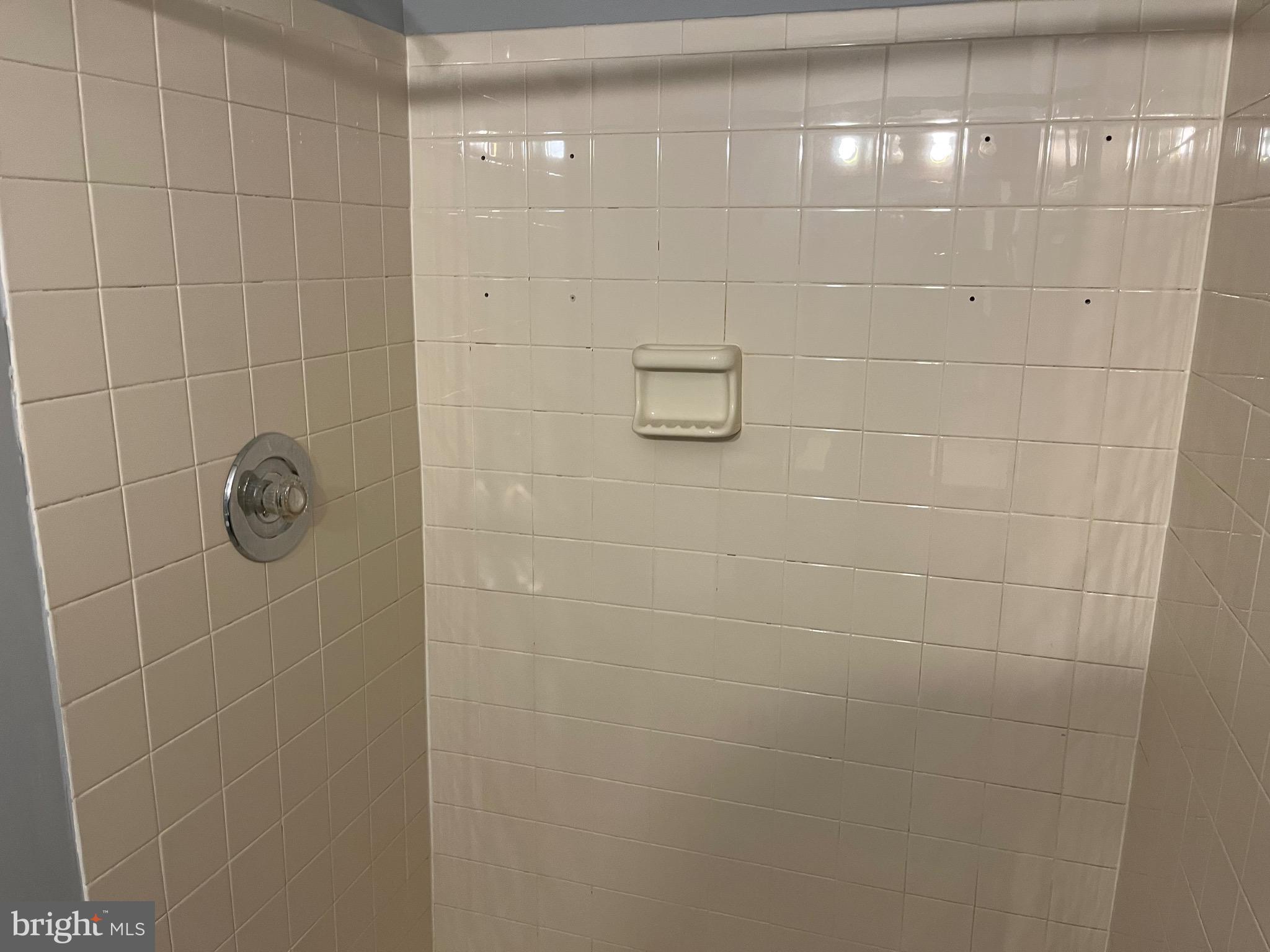 903 K Woodbridge Court, Unit 903K Edgewood, MD 21040 - Photo 3 of 9 a bathroom with a shower