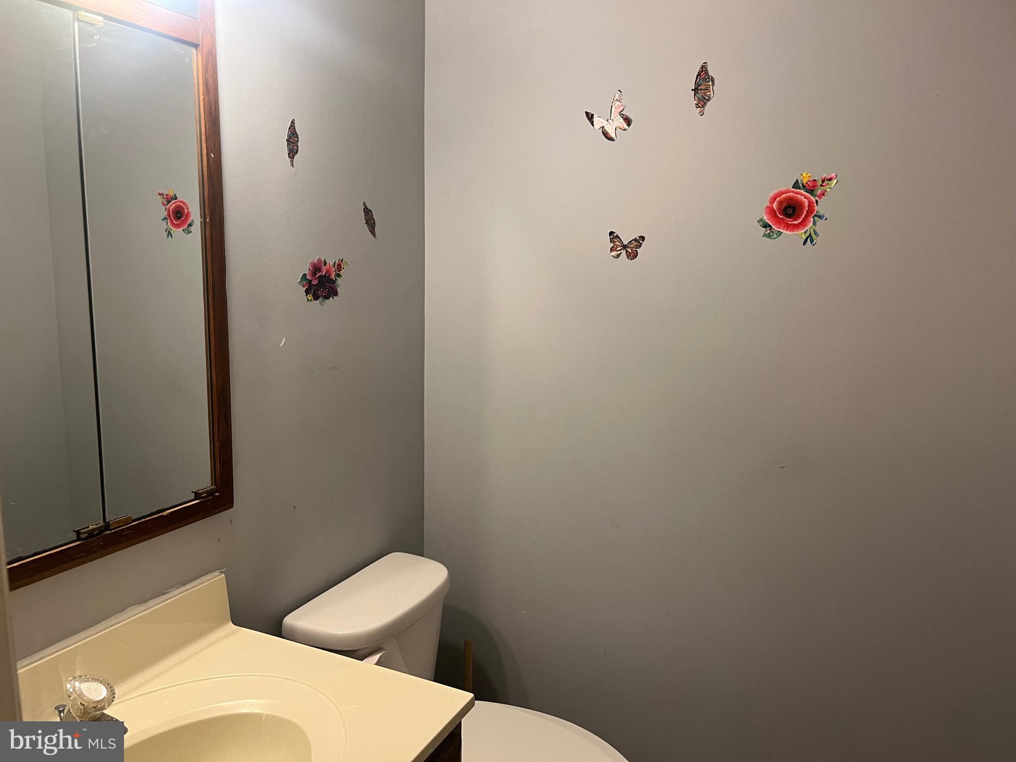 903 K Woodbridge Court, Unit 903K Edgewood, MD 21040 - Photo 4 of 9 a bathroom with a toilet and a sink