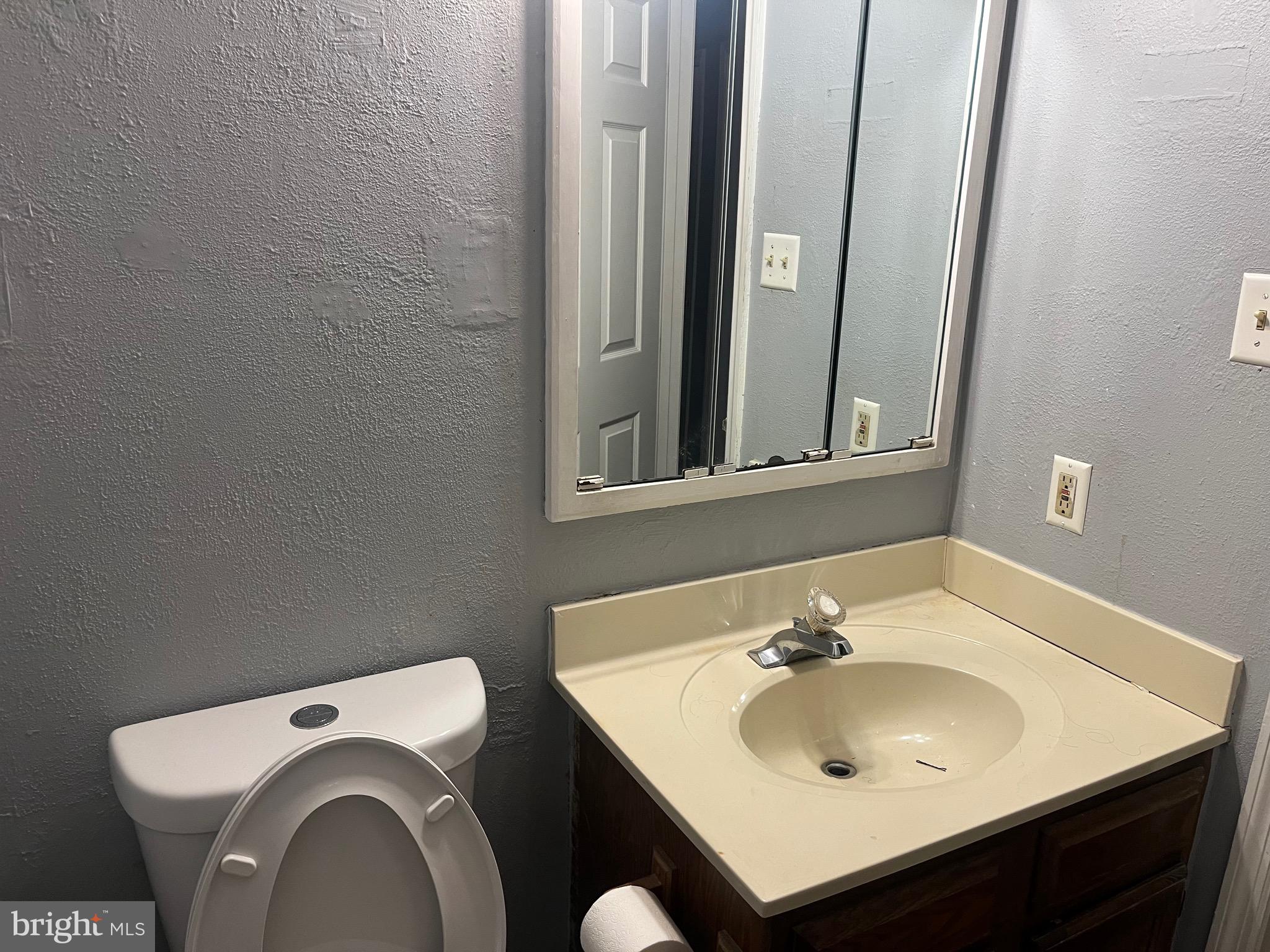 903 K Woodbridge Court, Unit 903K Edgewood, MD 21040 - Photo 6 of 9 a bathroom with a sink and a toilet