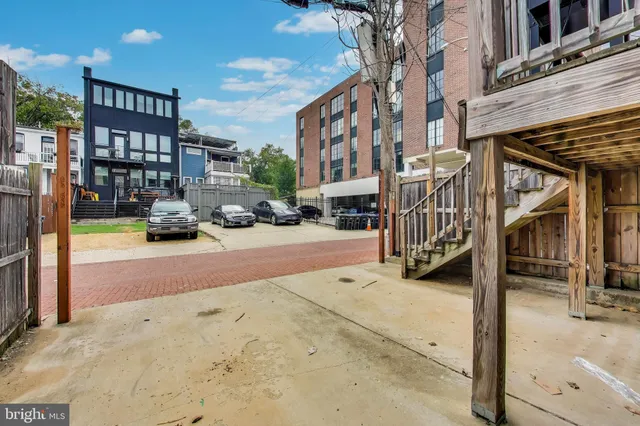 a view of a street with cars