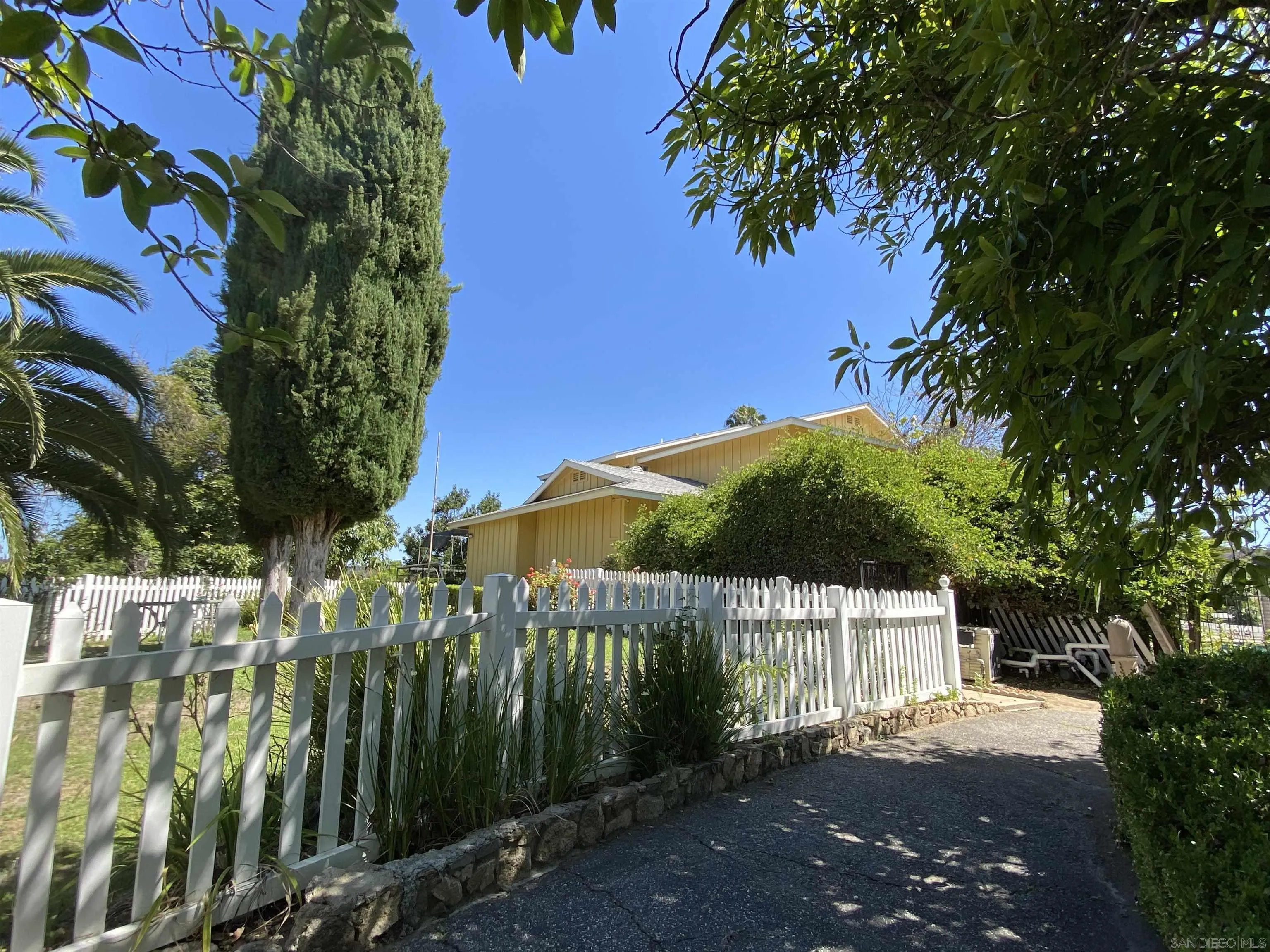 1780 Rabbit Hill Fallbrook, CA 92028 - Photo 14 of 60 a view of a house with a garden