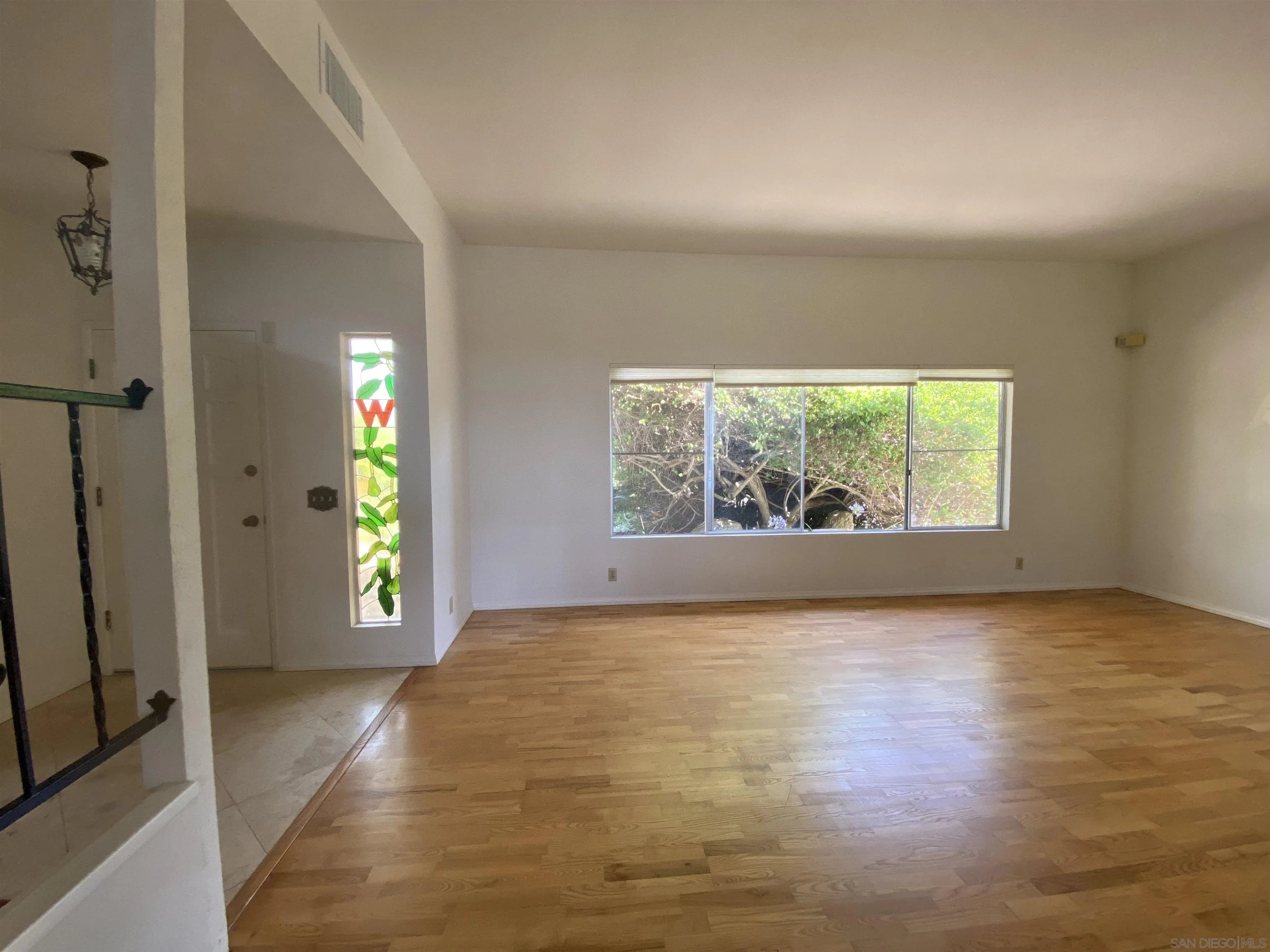 1780 Rabbit Hill Fallbrook, CA 92028 - Photo 18 of 60 an empty room with windows and entrance