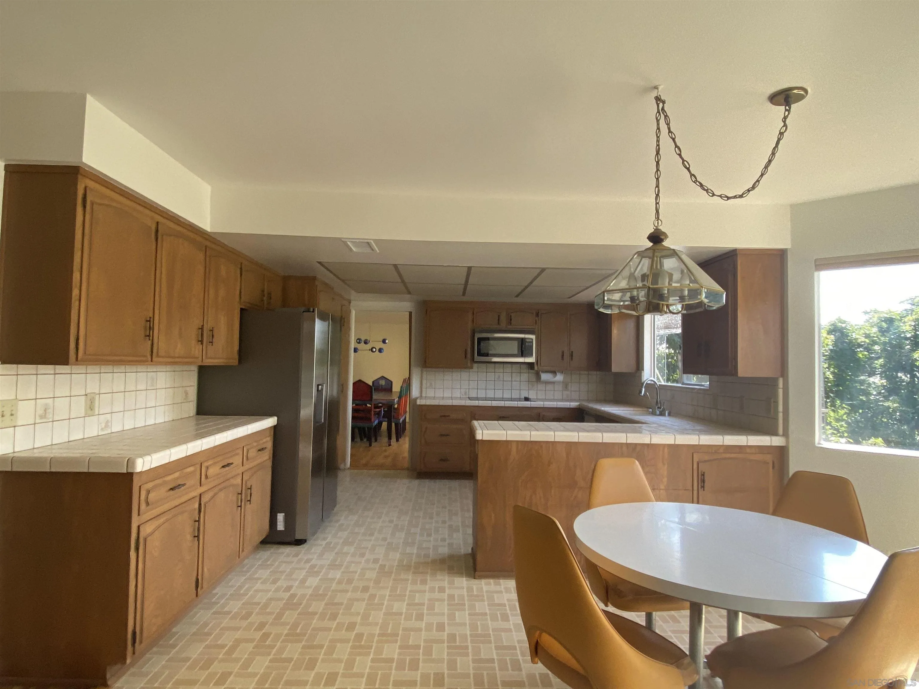 1780 Rabbit Hill Fallbrook, CA 92028 - Photo 24 of 60 a kitchen with counter top space cabinets and appliances