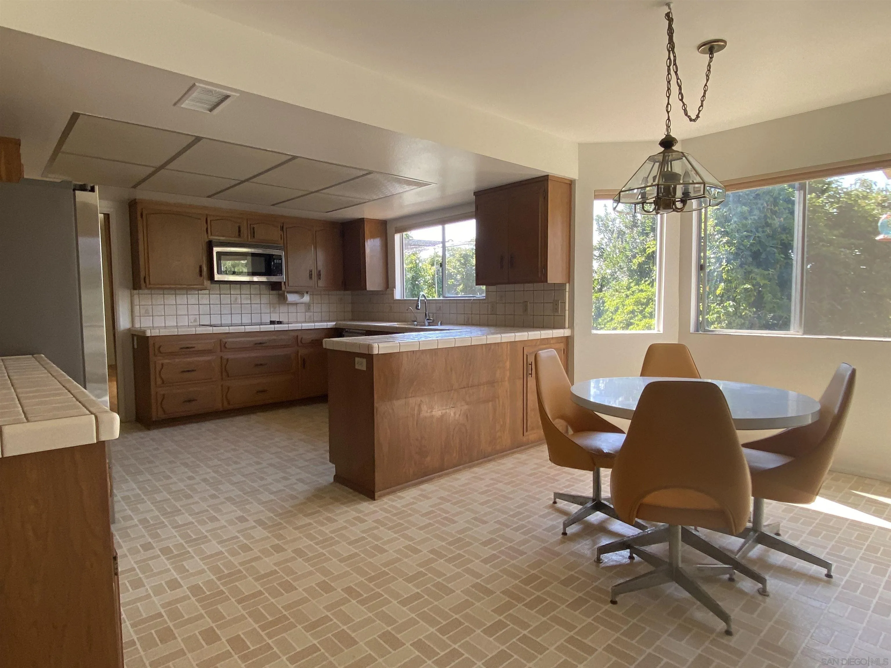 1780 Rabbit Hill Fallbrook, CA 92028 - Photo 25 of 60 a dining room with furniture and window