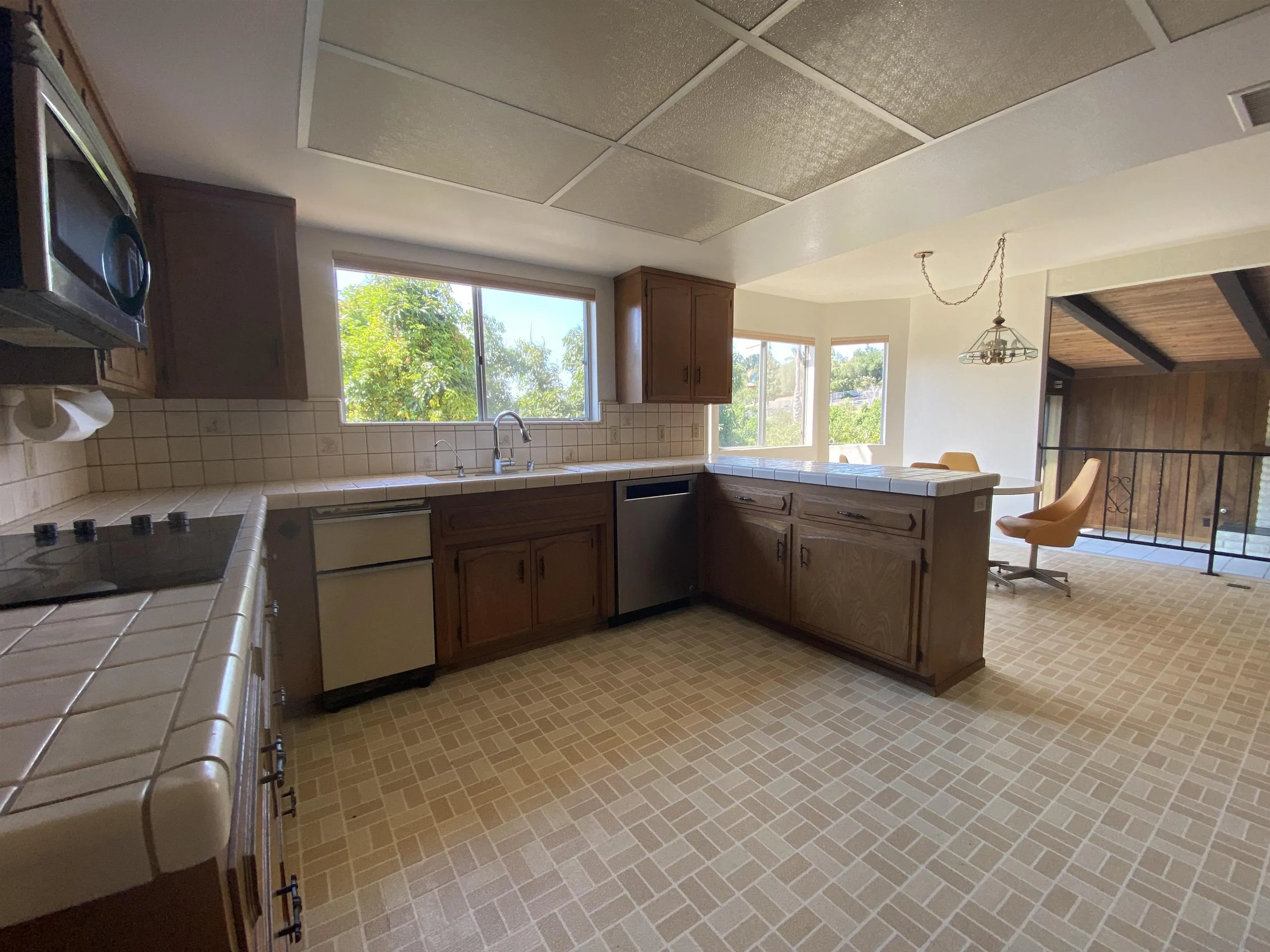 1780 Rabbit Hill Fallbrook, CA 92028 - Photo 27 of 60 a kitchen with stainless steel appliances kitchen island granite countertop a sink and a stove