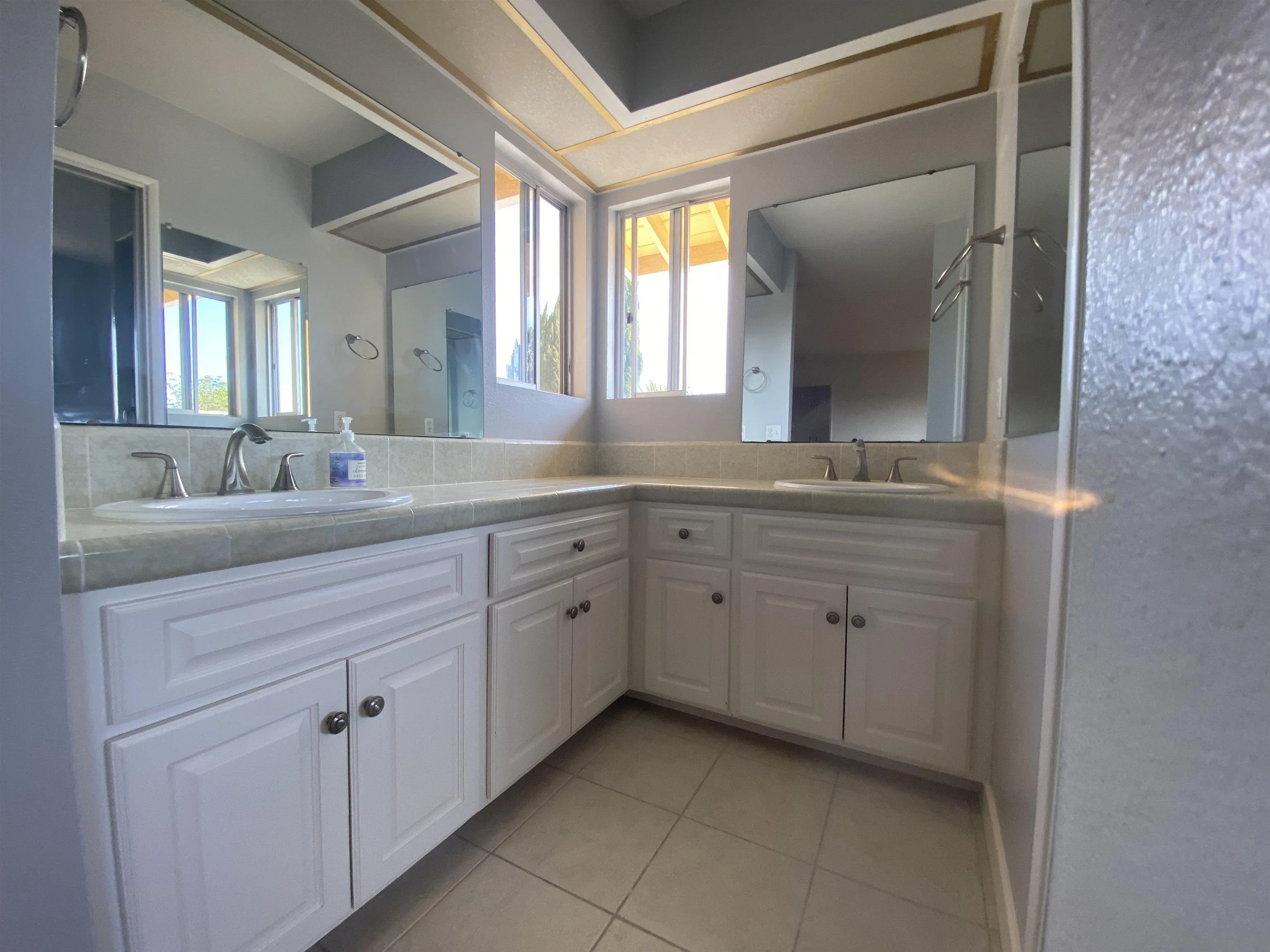 1780 Rabbit Hill Fallbrook, CA 92028 - Photo 36 of 60 a bathroom with a sink and mirror