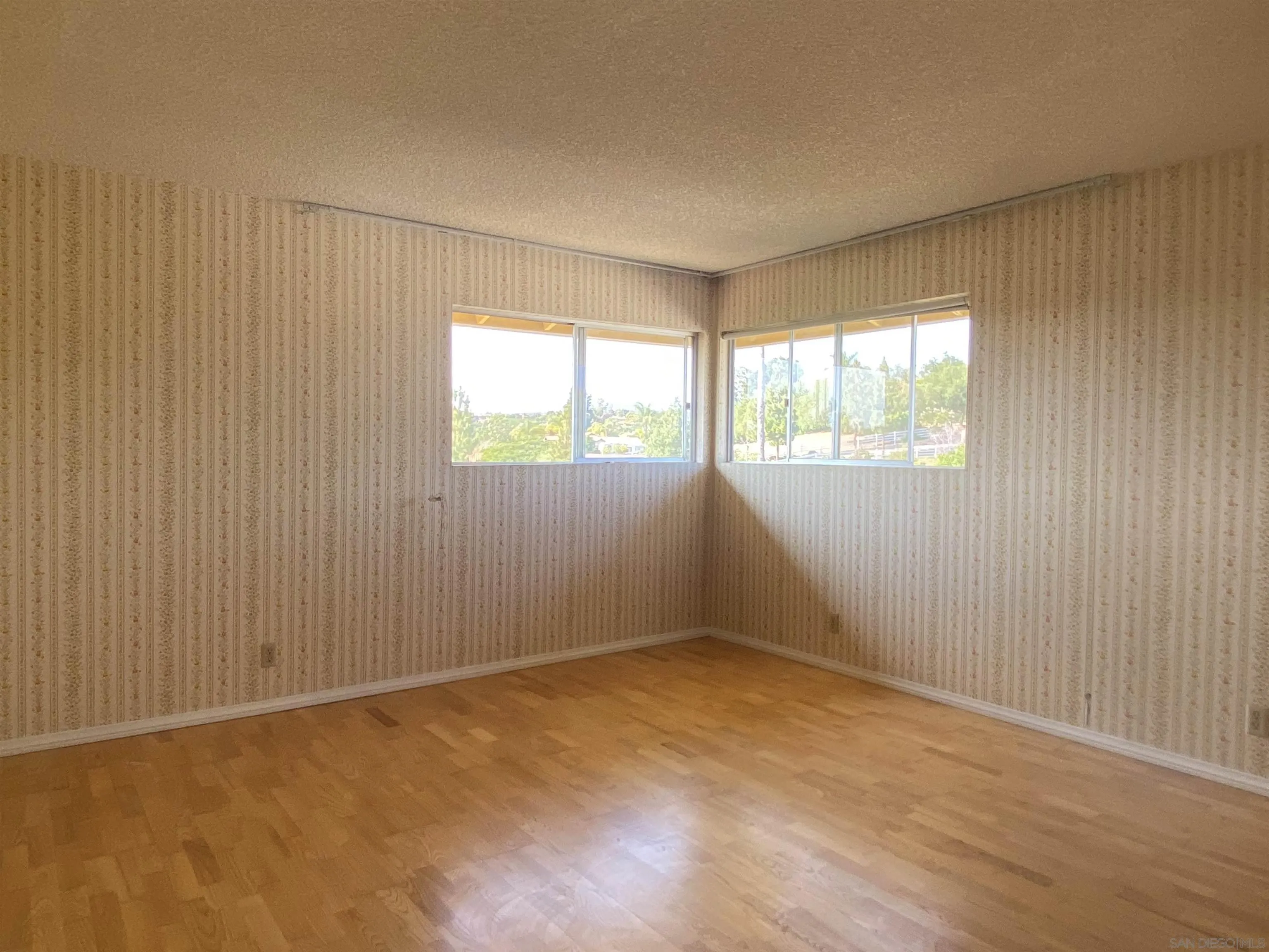 1780 Rabbit Hill Fallbrook, CA 92028 - Photo 39 of 60 an empty room with windows