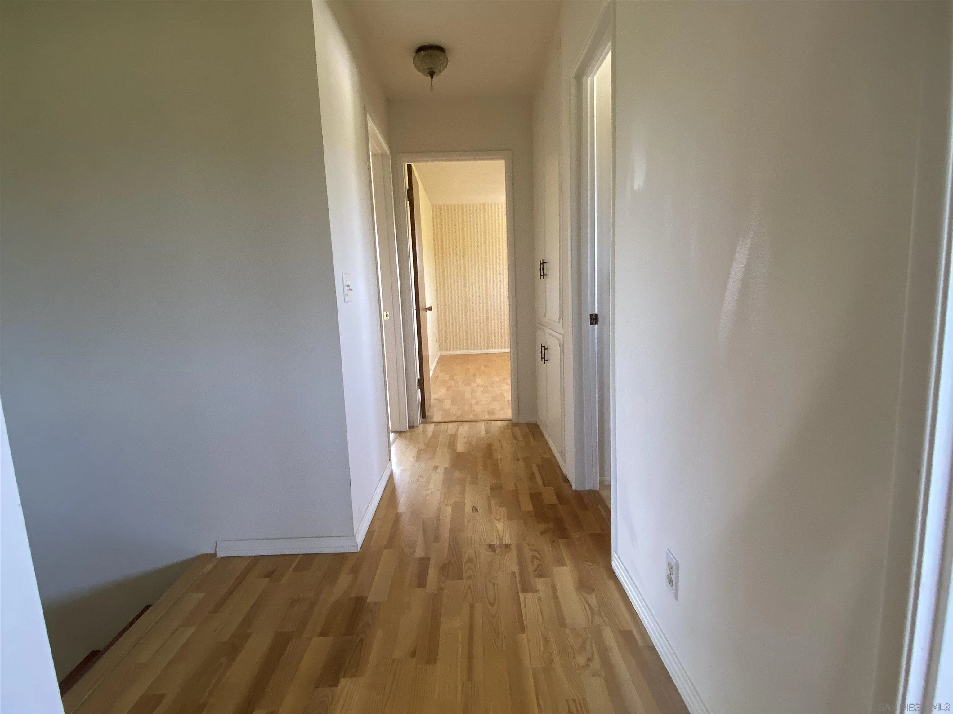 1780 Rabbit Hill Fallbrook, CA 92028 - Photo 46 of 60 a view of a hallway with wooden floor