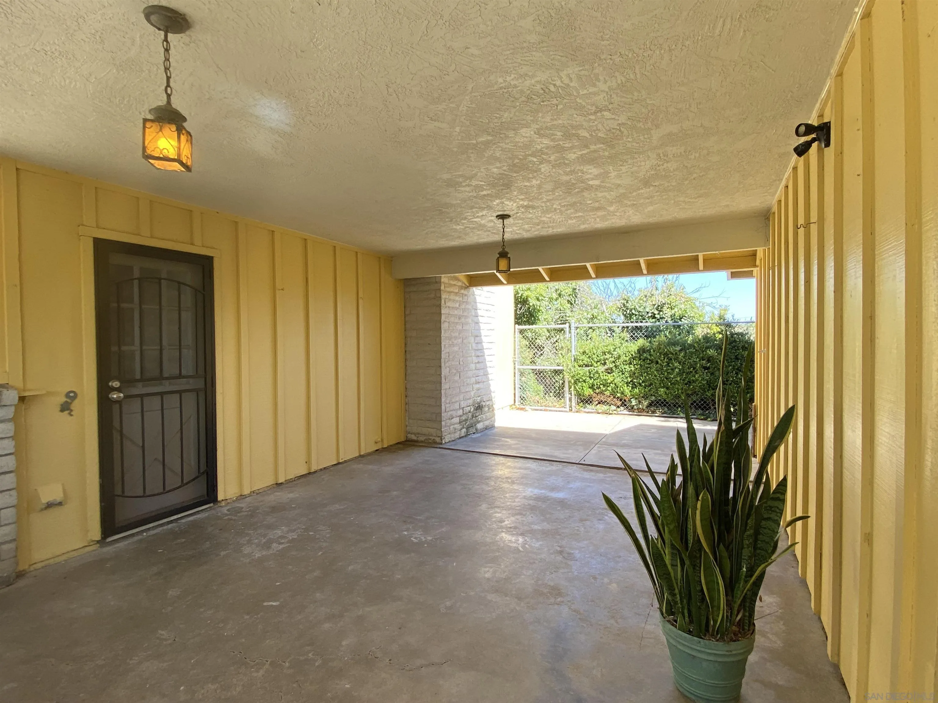 1780 Rabbit Hill Fallbrook, CA 92028 - Photo 7 of 60 a view of a room with a large window and wooden floor