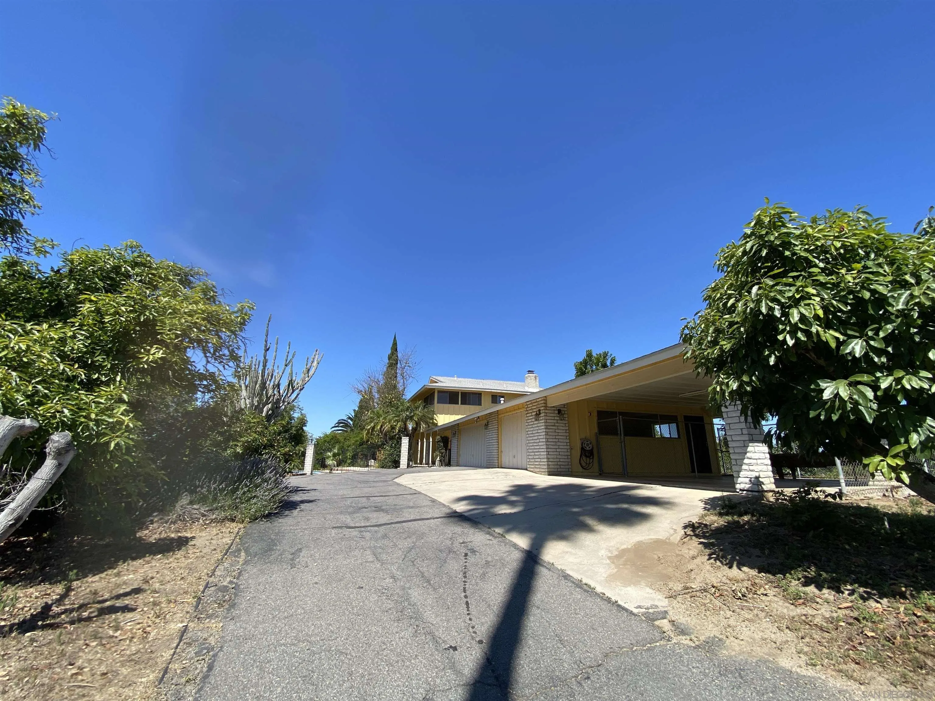 1780 Rabbit Hill Fallbrook, CA 92028 - Photo 10 of 60 a front view of a house with a yard