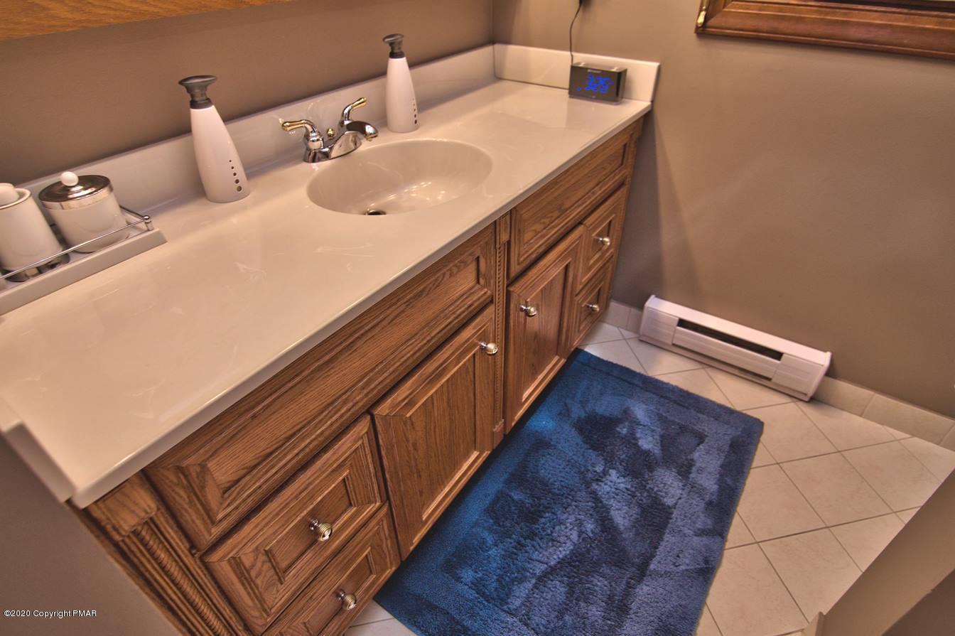 245 Crescent Lake Road Scotrun, PA 18355 - Photo 42 of 62 1st Floor Full Bath w Tile Floor