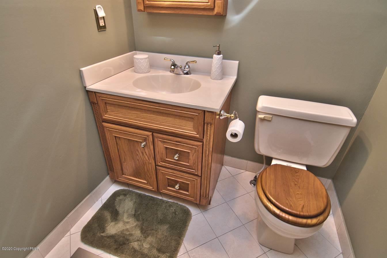 245 Crescent Lake Road Scotrun, PA 18355 - Photo 47 of 62 Master Bedroom Half Bath w Tile Floor