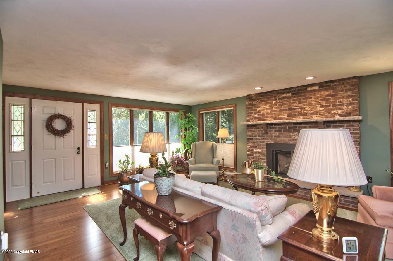 245 Crescent Lake Road Scotrun, PA 18355 - Photo 6 of 62 Sun-Splashed Family Room