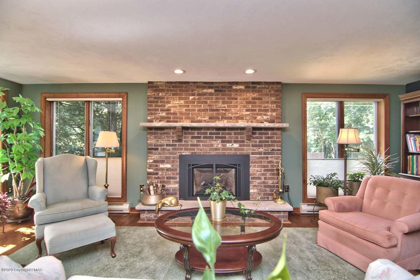 245 Crescent Lake Road Scotrun, PA 18355 - Photo 7 of 62 Family Room Brick Fireplace LP-Gas