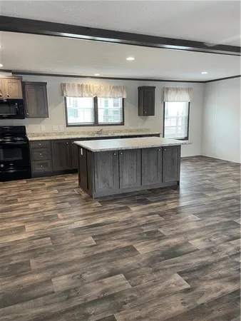 a view of kitchen and microwave