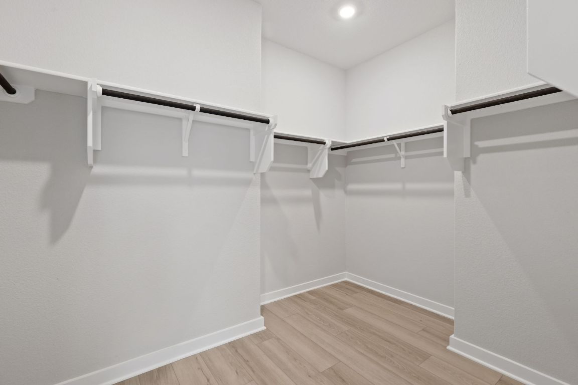 212 Lazy Lizzy Road Jarrell, TX 76537 - Photo 19 of 30 a view of an empty walk in closet