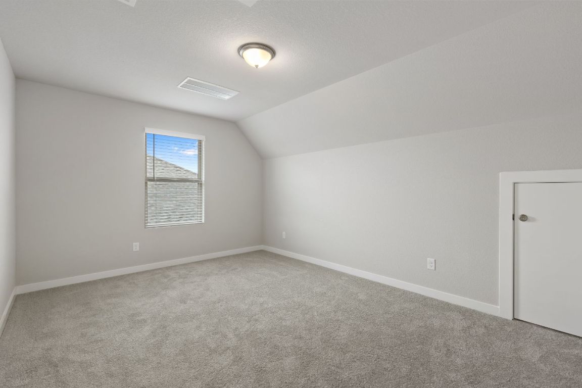 212 Lazy Lizzy Road Jarrell, TX 76537 - Photo 20 of 30 an empty room with windows