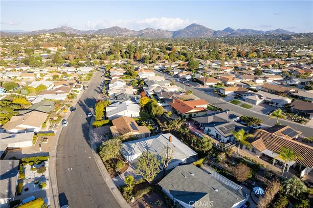 an aerial view of a city with lots of residential buildings